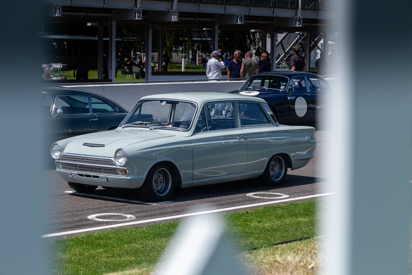 Mark one Ford Cortina on the Goodwood Motor Circuit start line